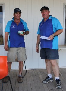 Brett Williamson (right) with Handicap Champion and Overall High Gun winner Doug Ferguson.